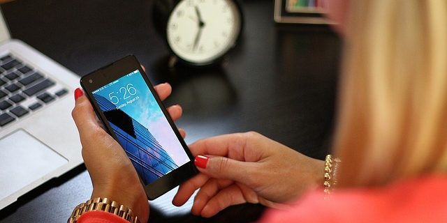 work desk, smart phone, laptop